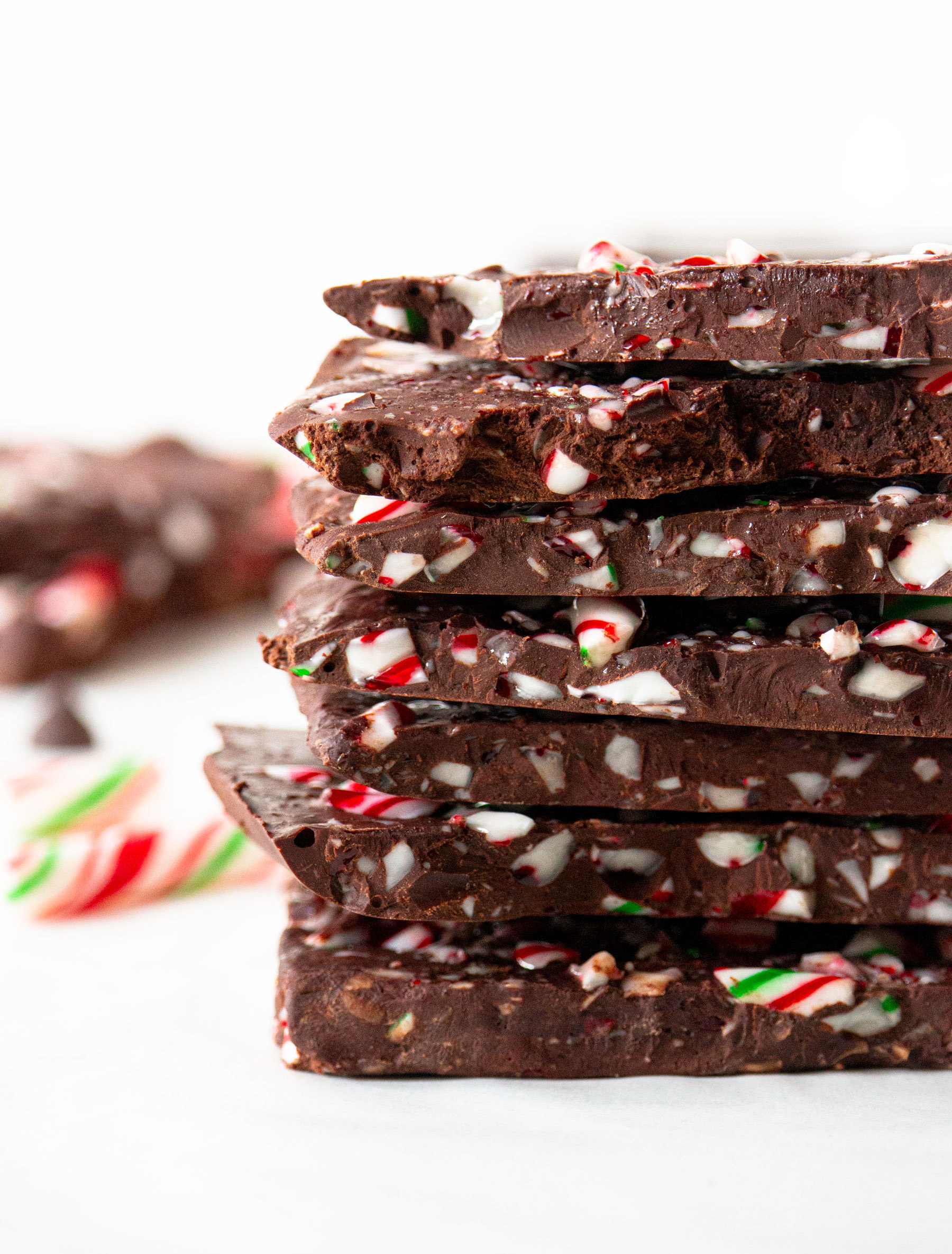 dark-chocolate-peppermint-bark-stacked-close-up-pure-sprinkles
